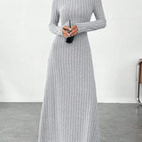 Robe pull longue col roulé