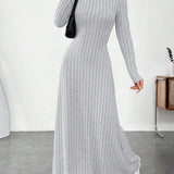 Robe pull longue col roulé